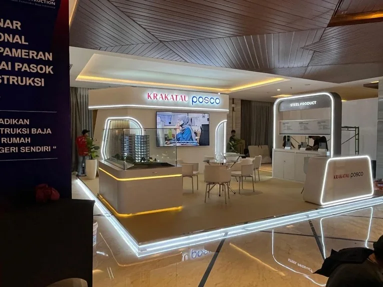 Industrial exhibition booth with warm architectural lighting